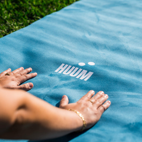 turquoise travel yoga mat stretches